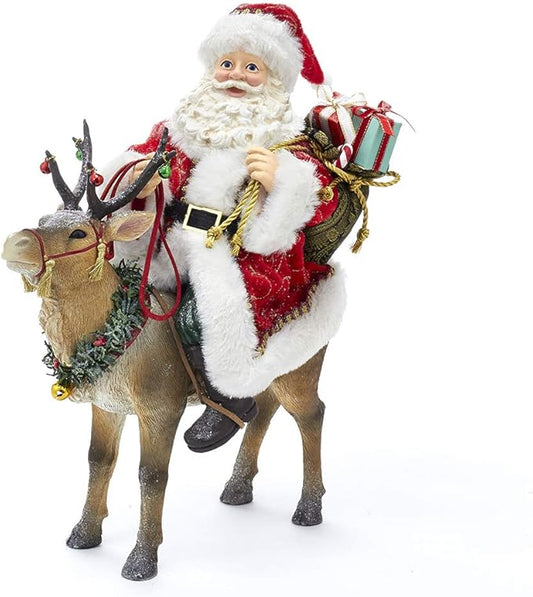 Babbo Natale a Cavallo di una Renna con Sacco 29 h cm
